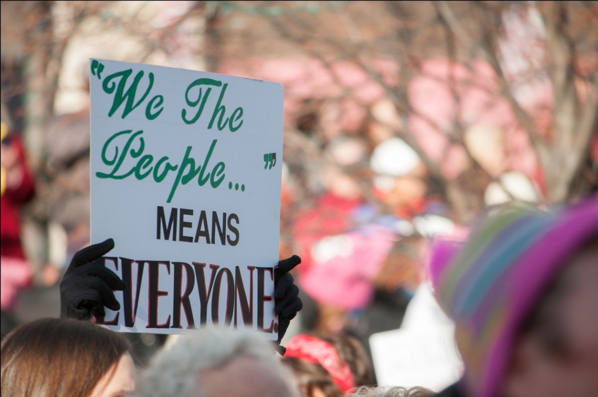 Photo of sign that says "We the people...means everyone"