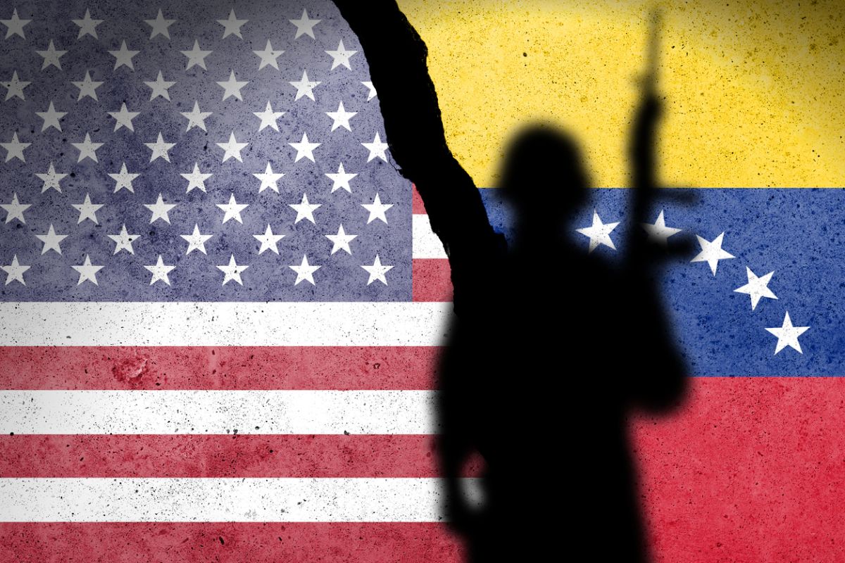 US Invaded Venezuela for Economic Impact - US Soldier with US and Venezuela flag behind