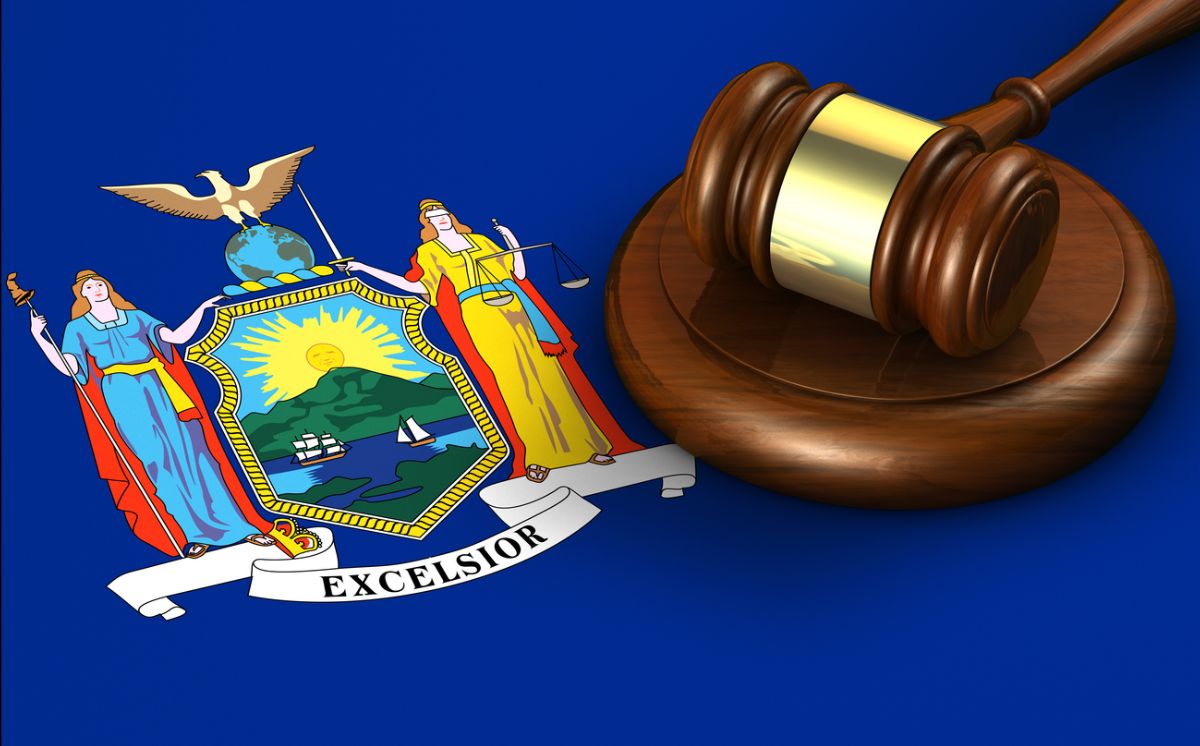 Legal industrial complex represented by a gavel and justice symbol