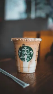 white and brown starbucks cup by Gema Saputera courtesy of Unsplash.